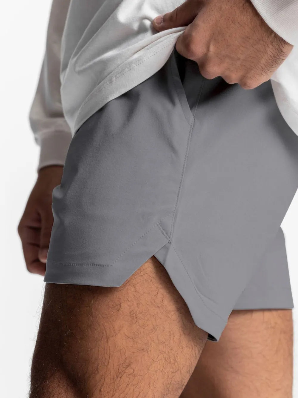 Men's elastic-waist active shorts in gray, with side pocket and adjustable waistband.