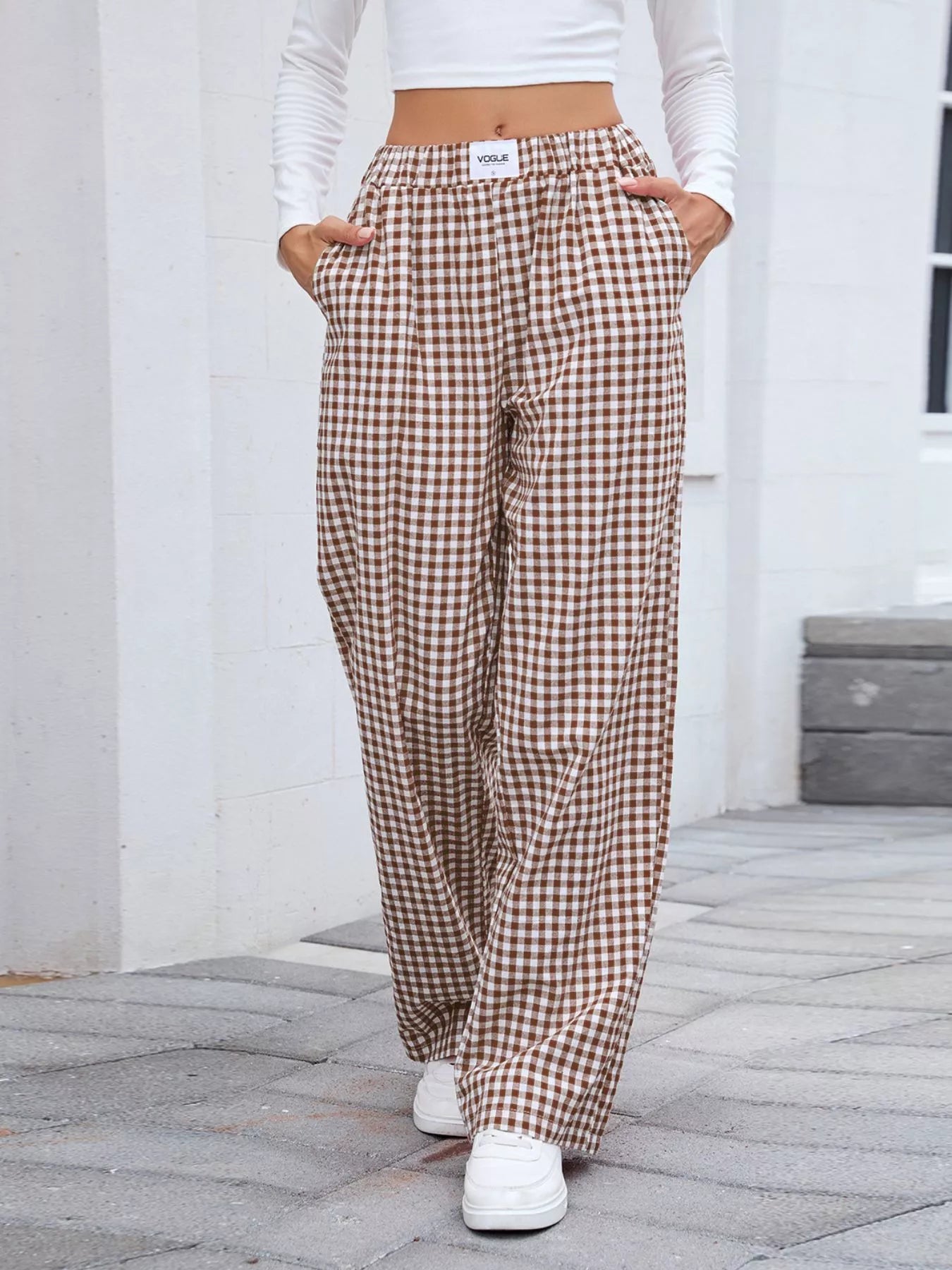 Plaid wide-leg casual pants in brown and cream, front view with relaxed wide legs.