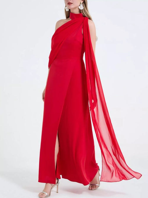 Red maxi dress with asymmetrical neckline, draped sleeve, and high slit
