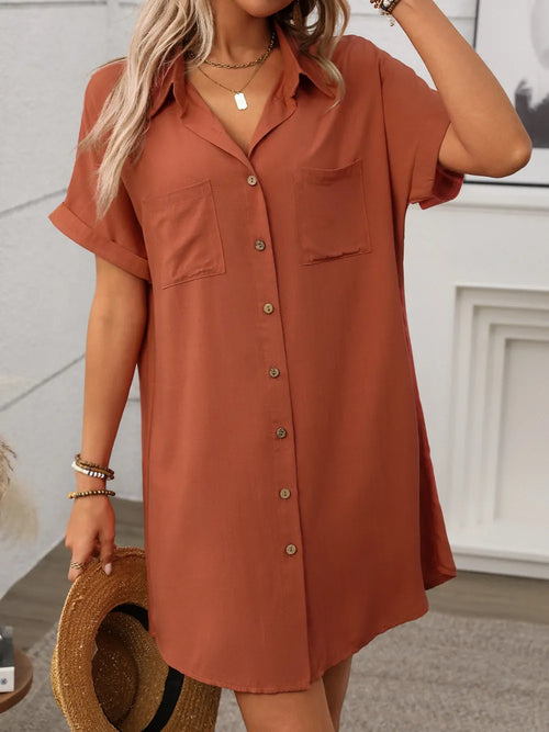 Caramel shirt-style mini dress with short sleeves, V neckline, and front buttons.