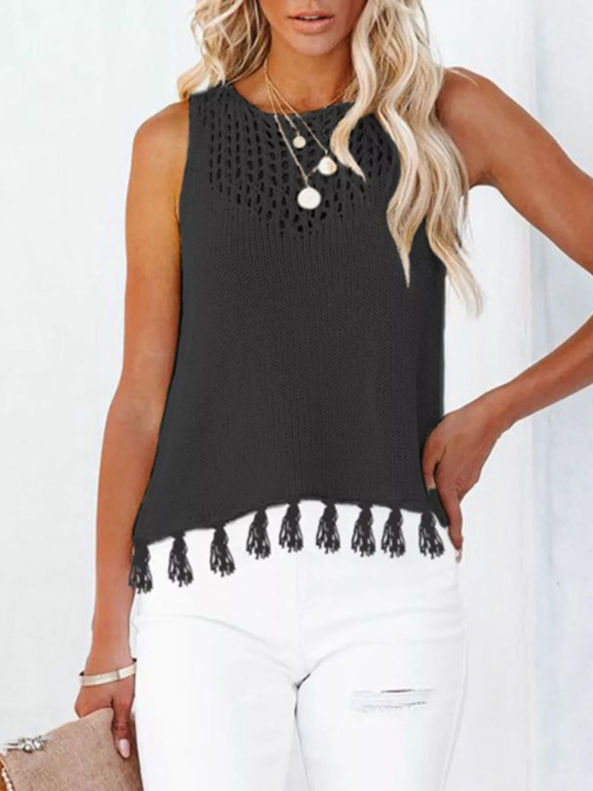 Black crochet knit tank top with tassel hem and gold button placket