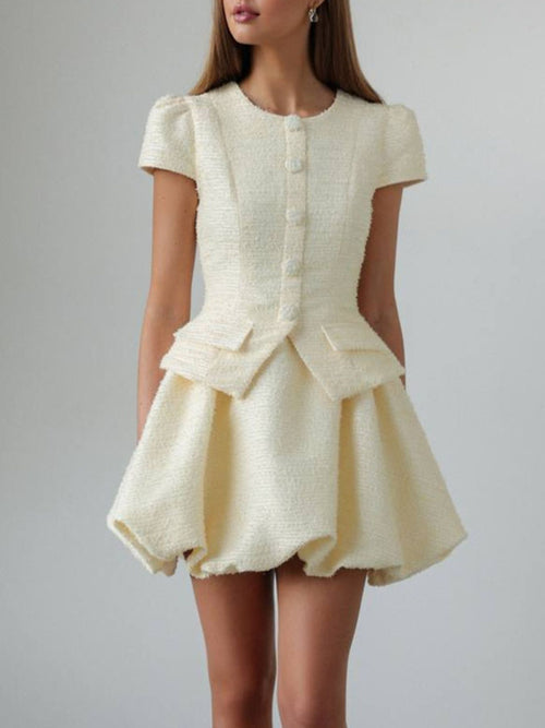 Cream short-sleeve button-up top and bubble-hem skirt set, textured fabric look.