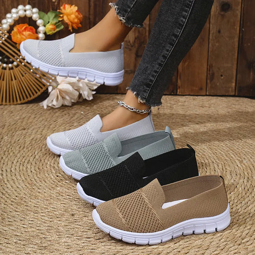 Breathable mesh athletic slip-on shoes in light gray with white sole