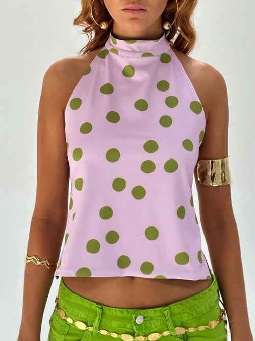 Backless printed halter tank in lavender pink with green dot pattern, cropped hem