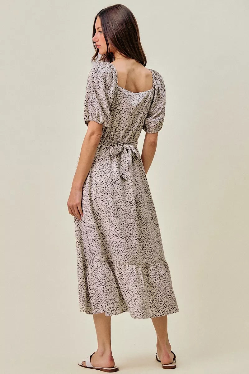 Off white/black ditsy floral midi dress with square neckline, puff sleeves, and elasticated waist