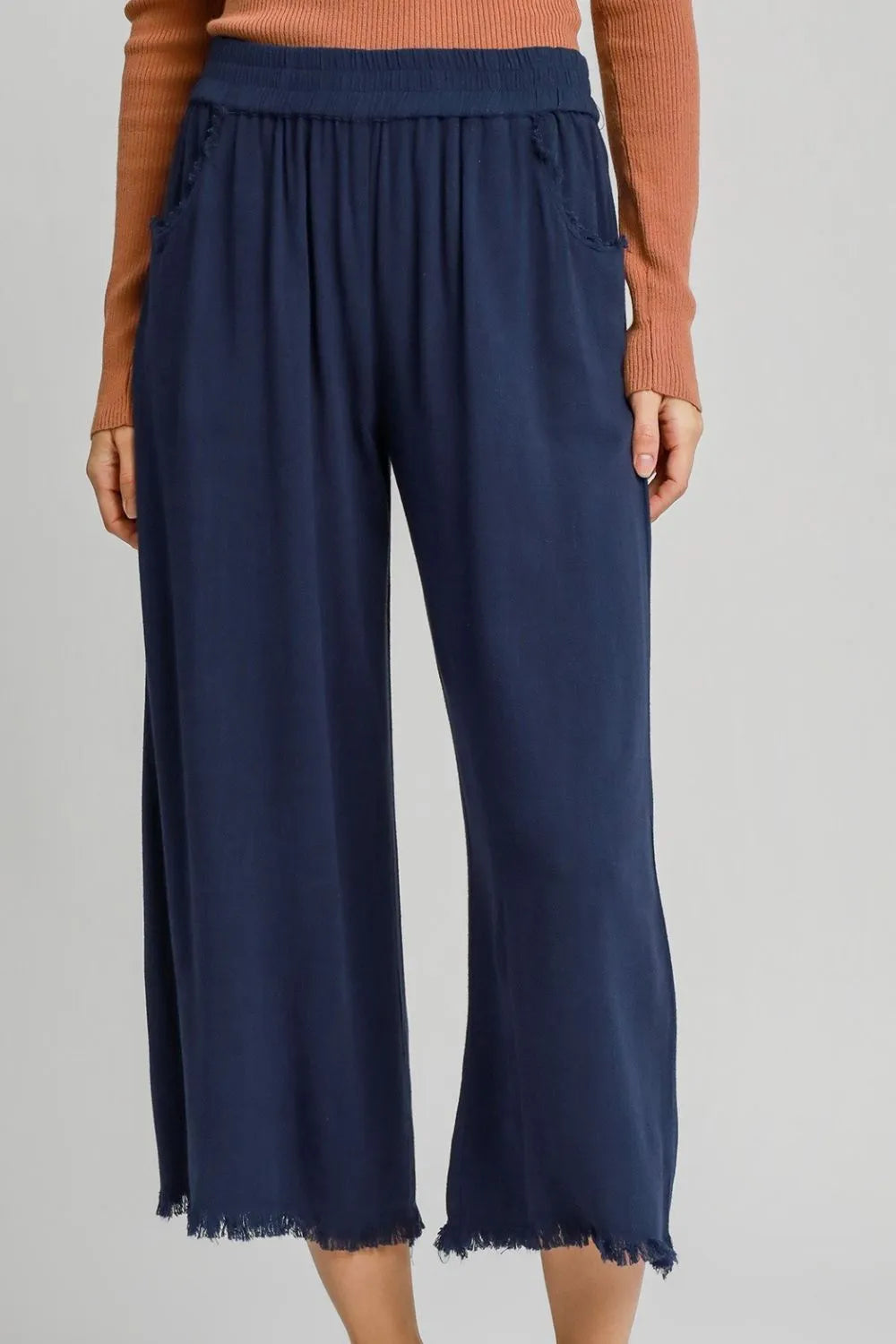 Plus-size wide-leg pants with elastic waistband, dark blue.