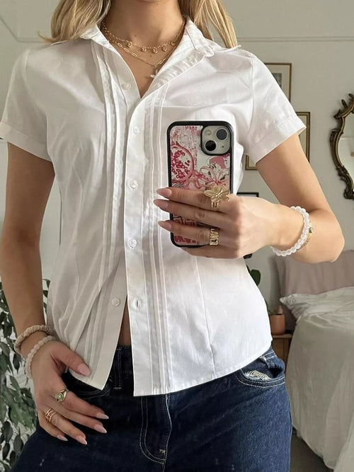 White pleated short-sleeve button shirt with pointed collar and chest buttons
