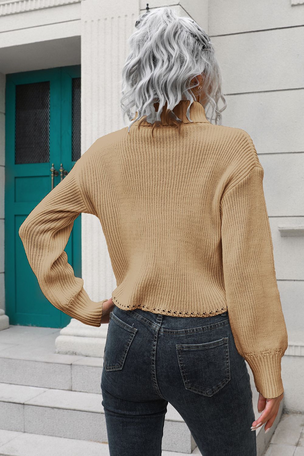 Camel turtleneck dropped-shoulder sweater, back view, ribbed knit, cuffed long sleeves.