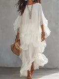 White ruffled layered bohemian maxi dress with tiered flutter sleeves
