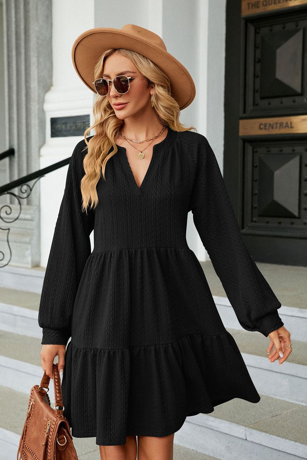 Black notched neck long sleeve mini dress with tiered skirt