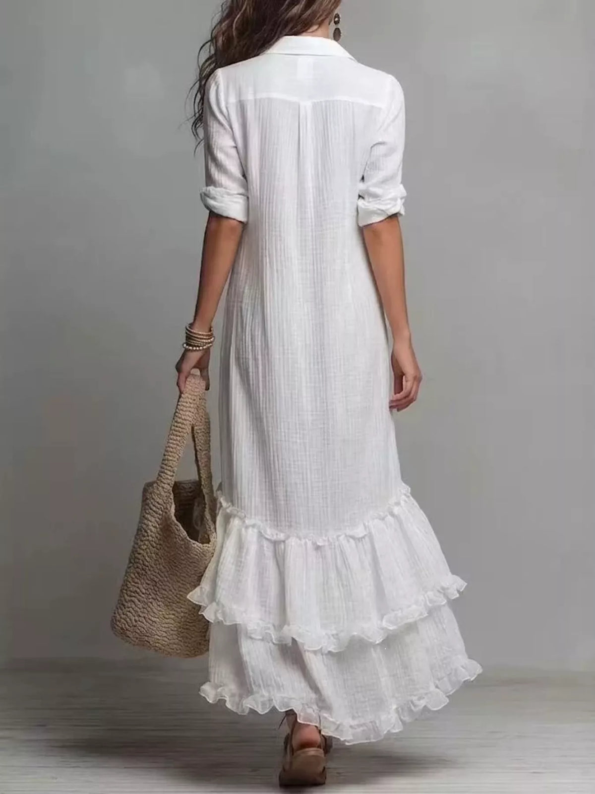 Back view of boho button-down maxi dress in white with tiered ruffle hem