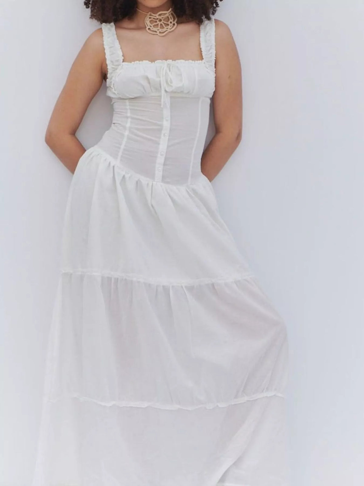 White cotton tiered maxi dress with ruffled square neck and smocked bodice