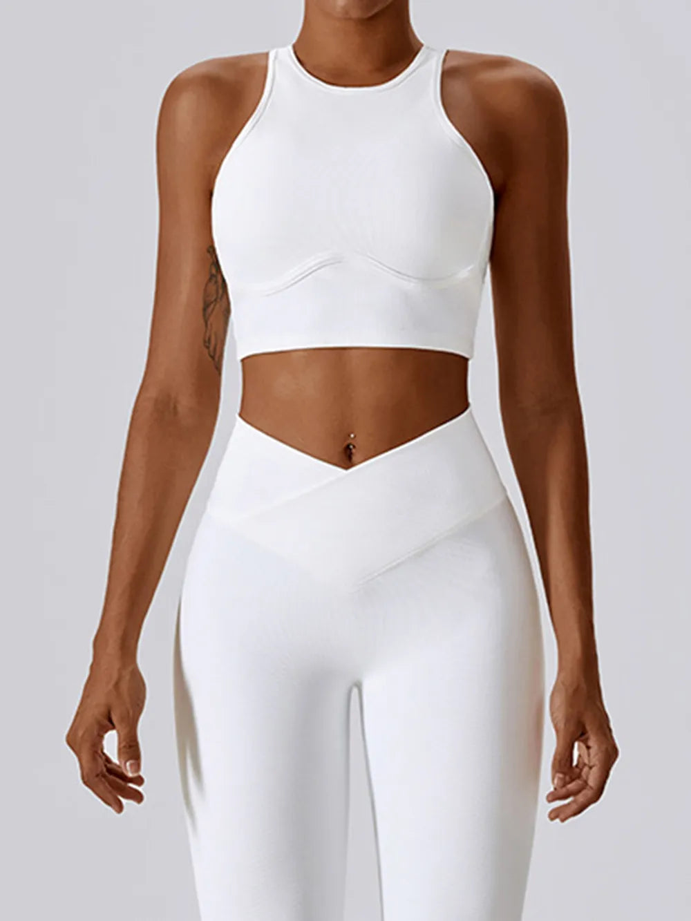 White racerback active crop tank top with curved under-bust cutout