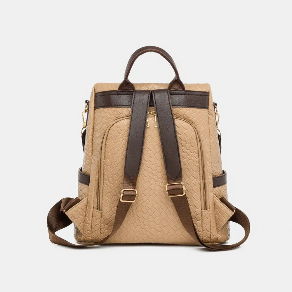 Vegan leather backpack bag in tan with dark straps and front zipper pocket.