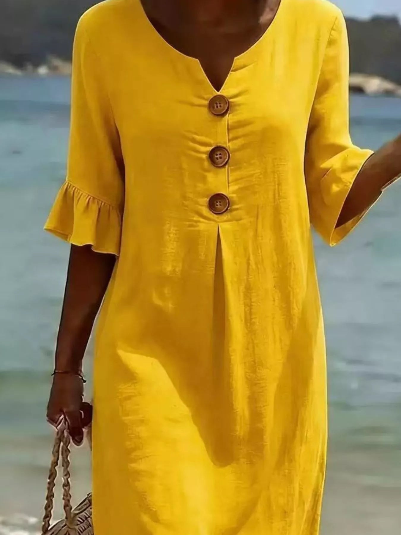 Yellow linen-look midi dress with button front and ruffle sleeves