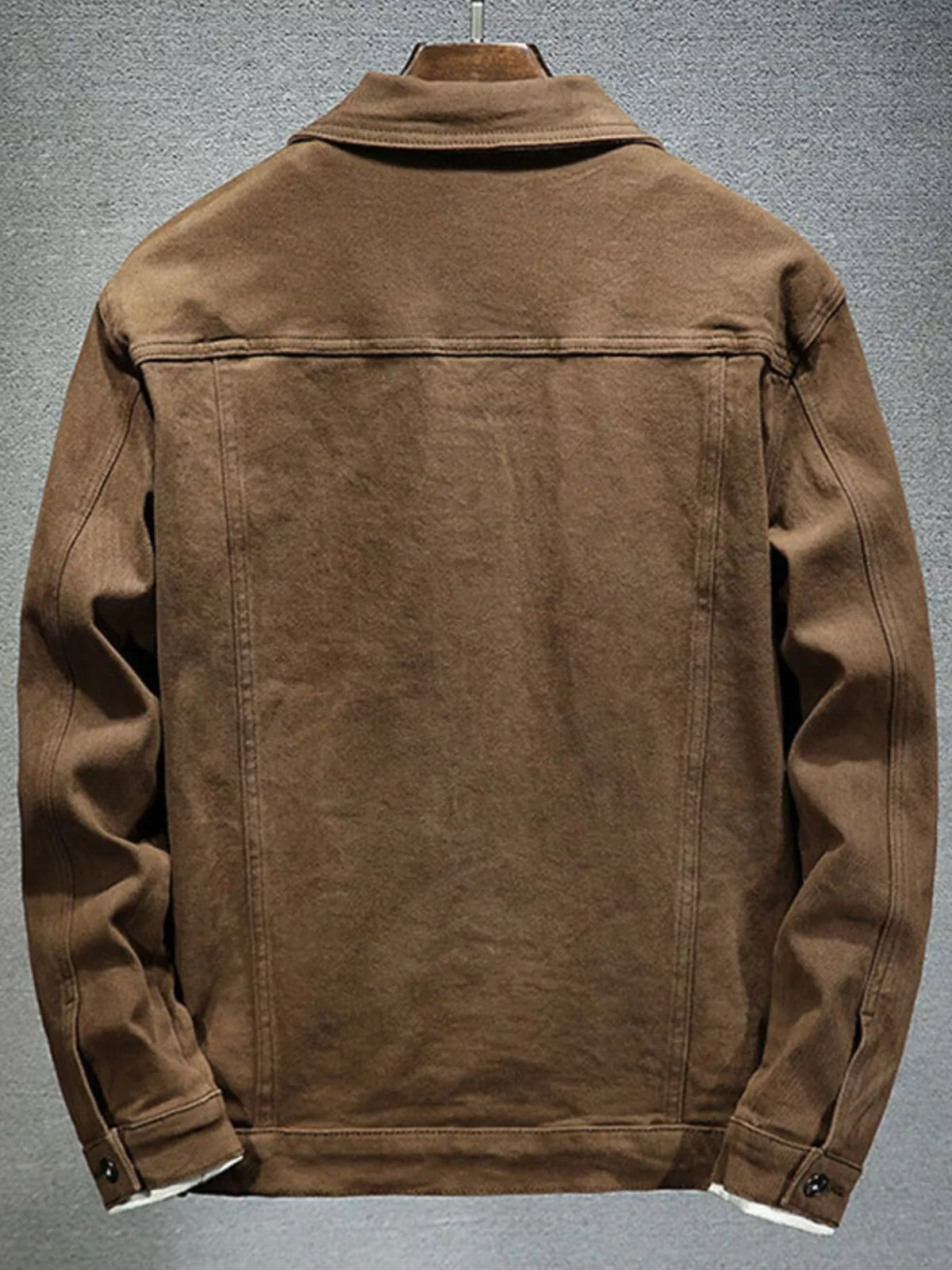 Coffee men’s denim button-up jacket, back view with yoke seam