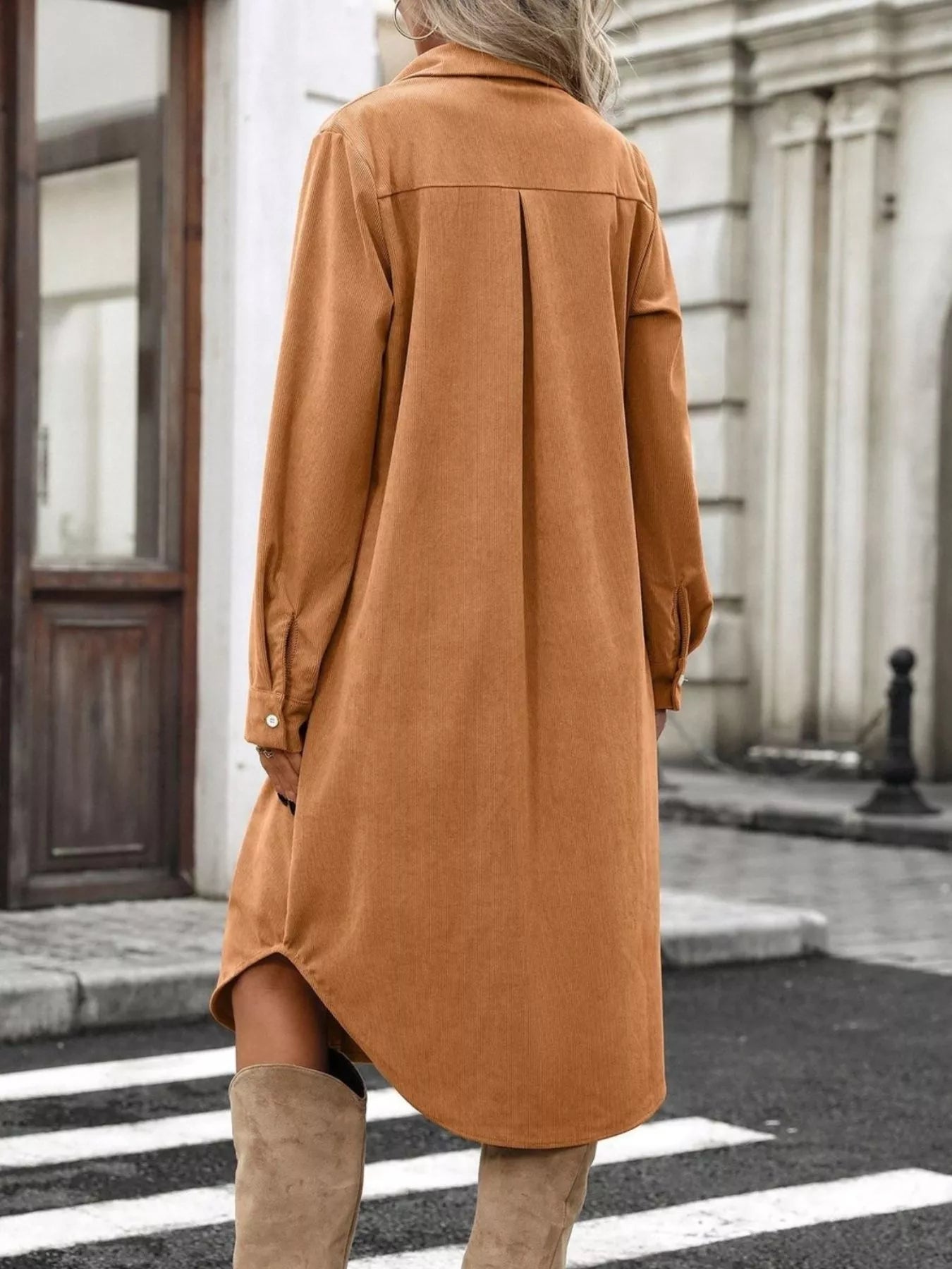Brown corduroy shirt dress back view with long sleeves and relaxed straight hem