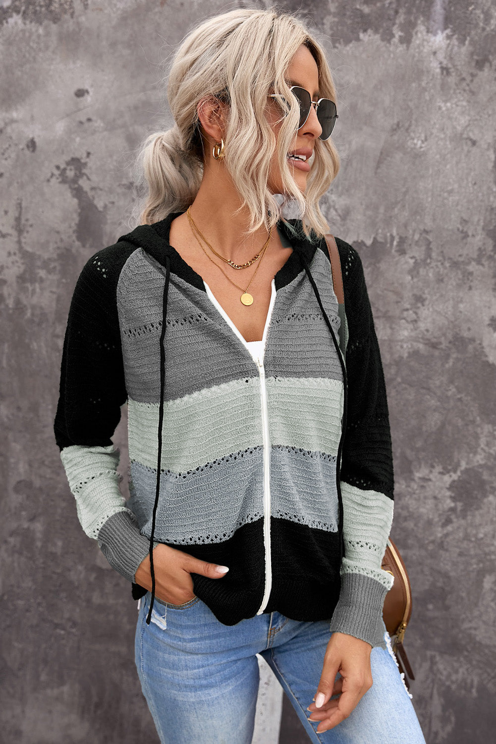 Black zip-up hooded cardigan with openwork yoke, gray and white stripe panels