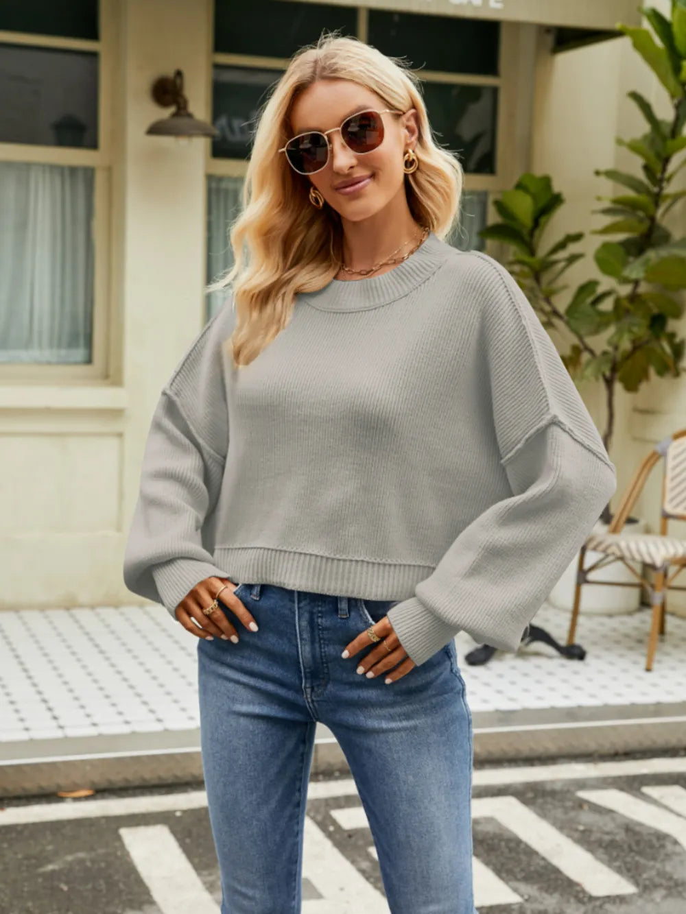 Heather gray round-neck lantern sleeve sweater with ribbed cuffs and hem