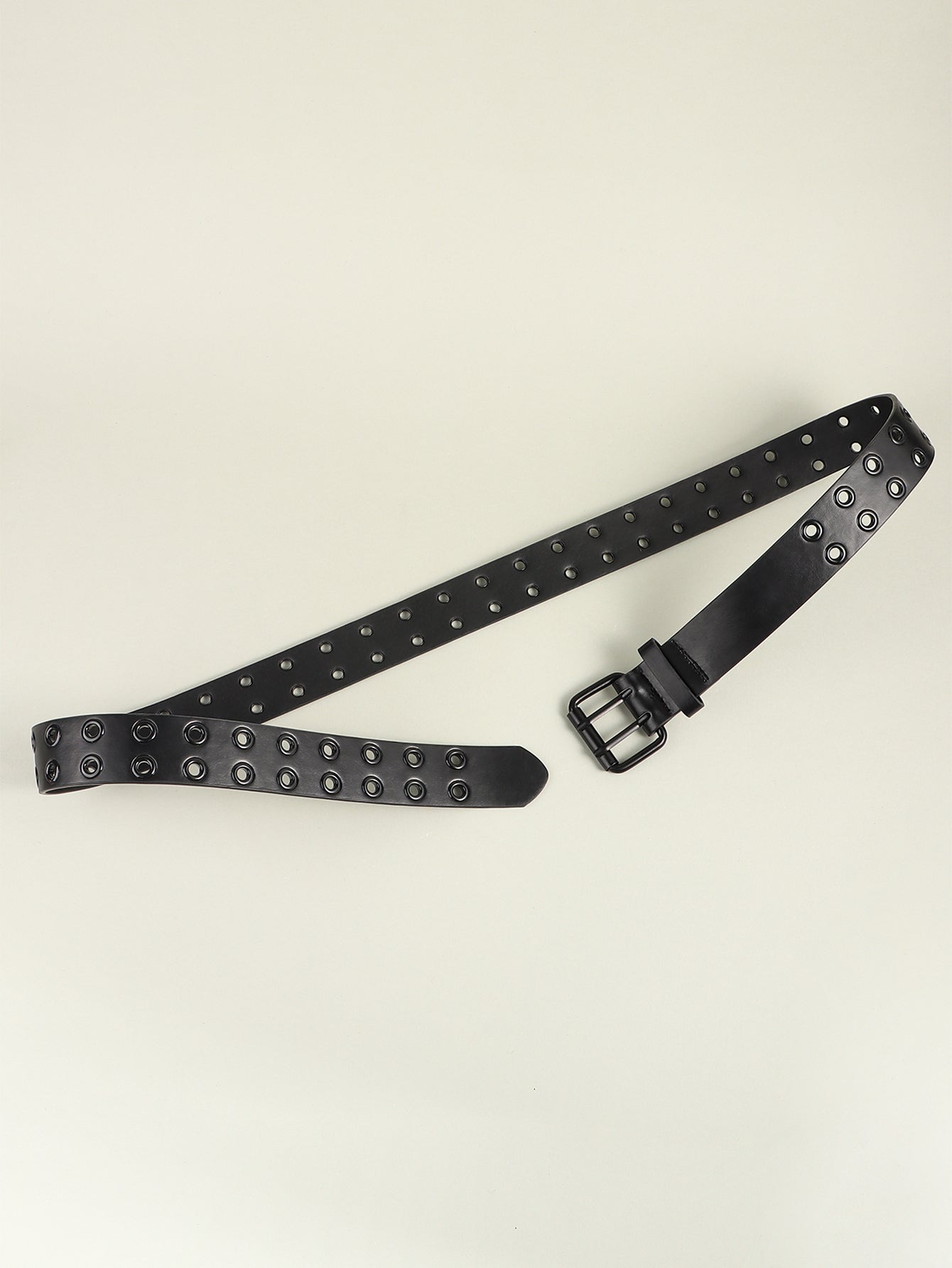 Black wide belt with metal grommets and square buckle, strap laid out.