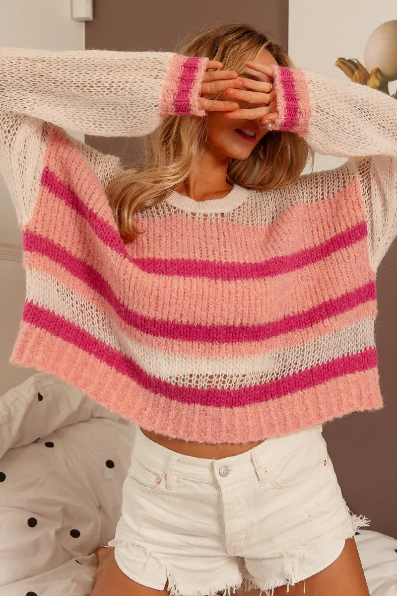 Striped knit sweater, ivory with pink and magenta horizontal stripes; wide open sleeves