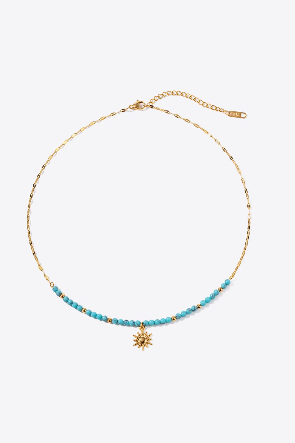 Turquoise beaded gold link necklace with sun pendant charm and clasp ends