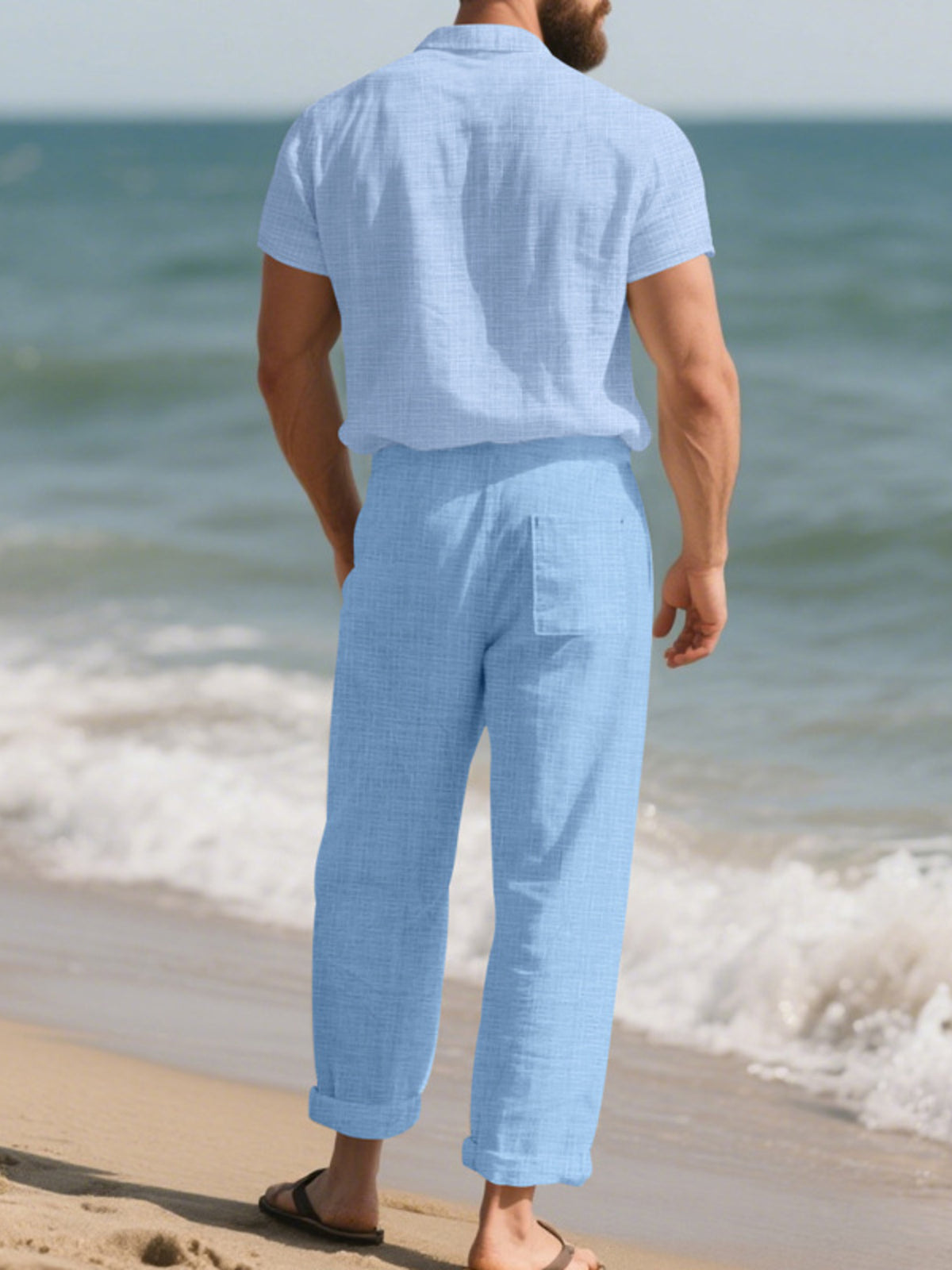 Light blue men’s short-sleeve button-up shirt and matching relaxed pants set