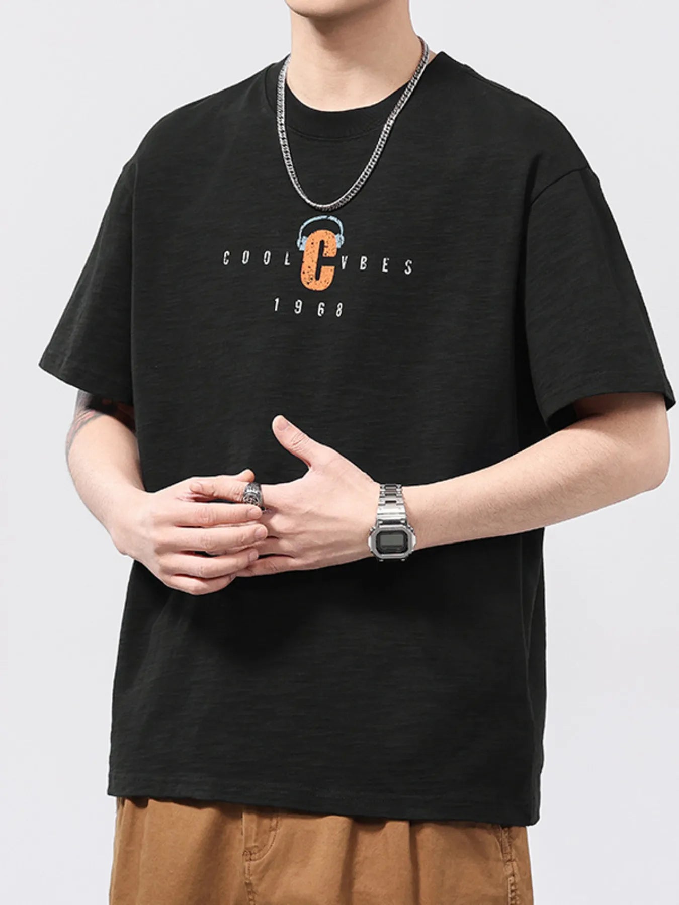 Men's plus size T-shirt, black, round neck, short sleeves, small chest logo