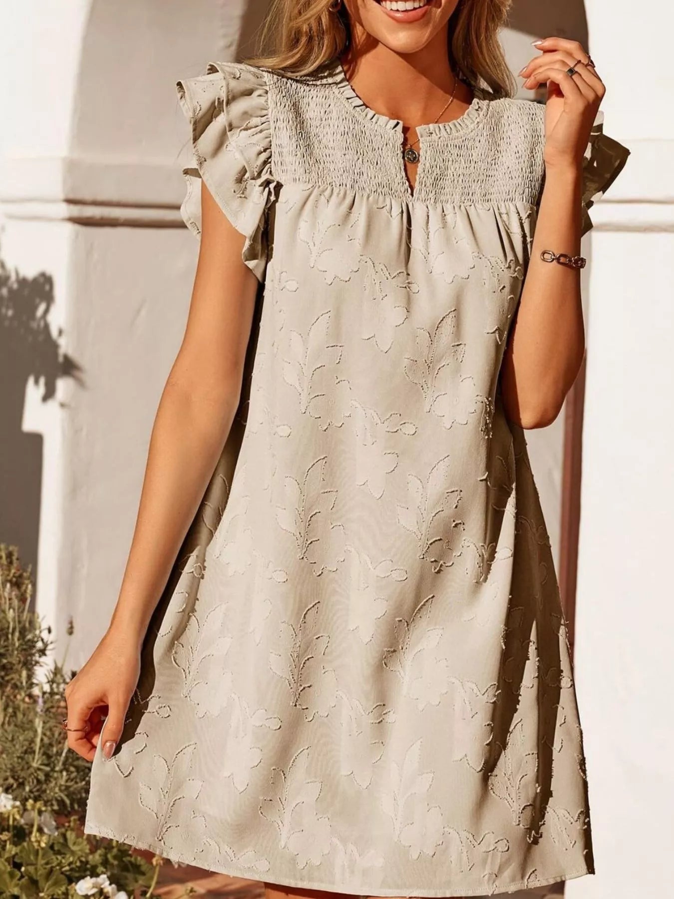 Trendsi Floral Embossed Ruffle Sleeve Mini Dress in beige with smocked bodice