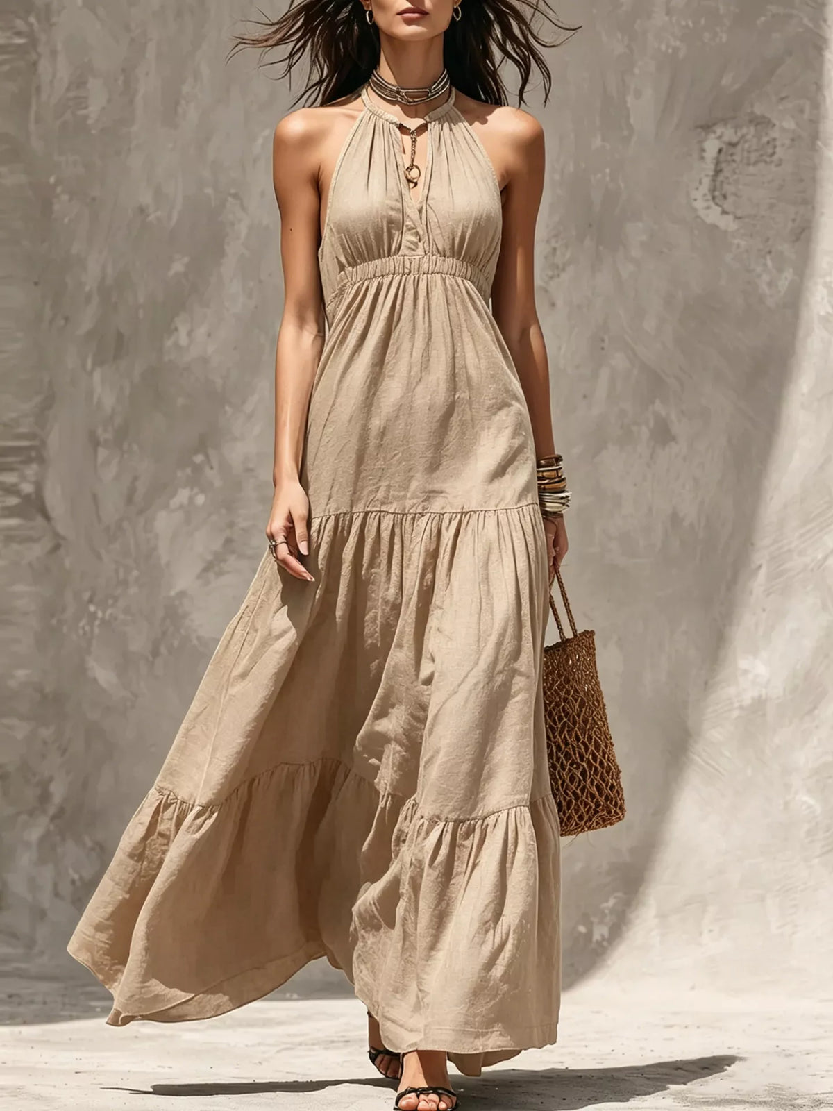Khaki halter tiered maxi dress with gathered bodice and layered ruffle skirt.