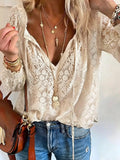 White openwork lace long-sleeve blouse with V-neck and relaxed fit