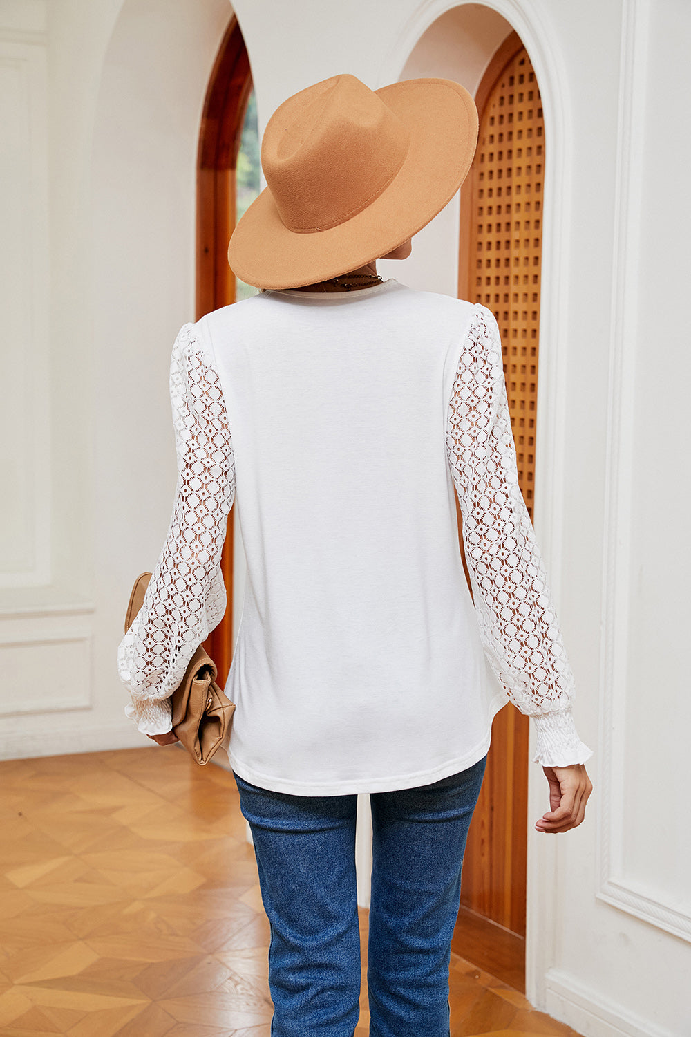 White contrast V-neck long-sleeve blouse, back view, textured lace-look sleeves