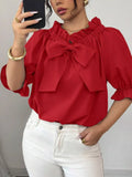 Bow Flounce Sleeve Blouse in red with a large front bow and puff sleeves.