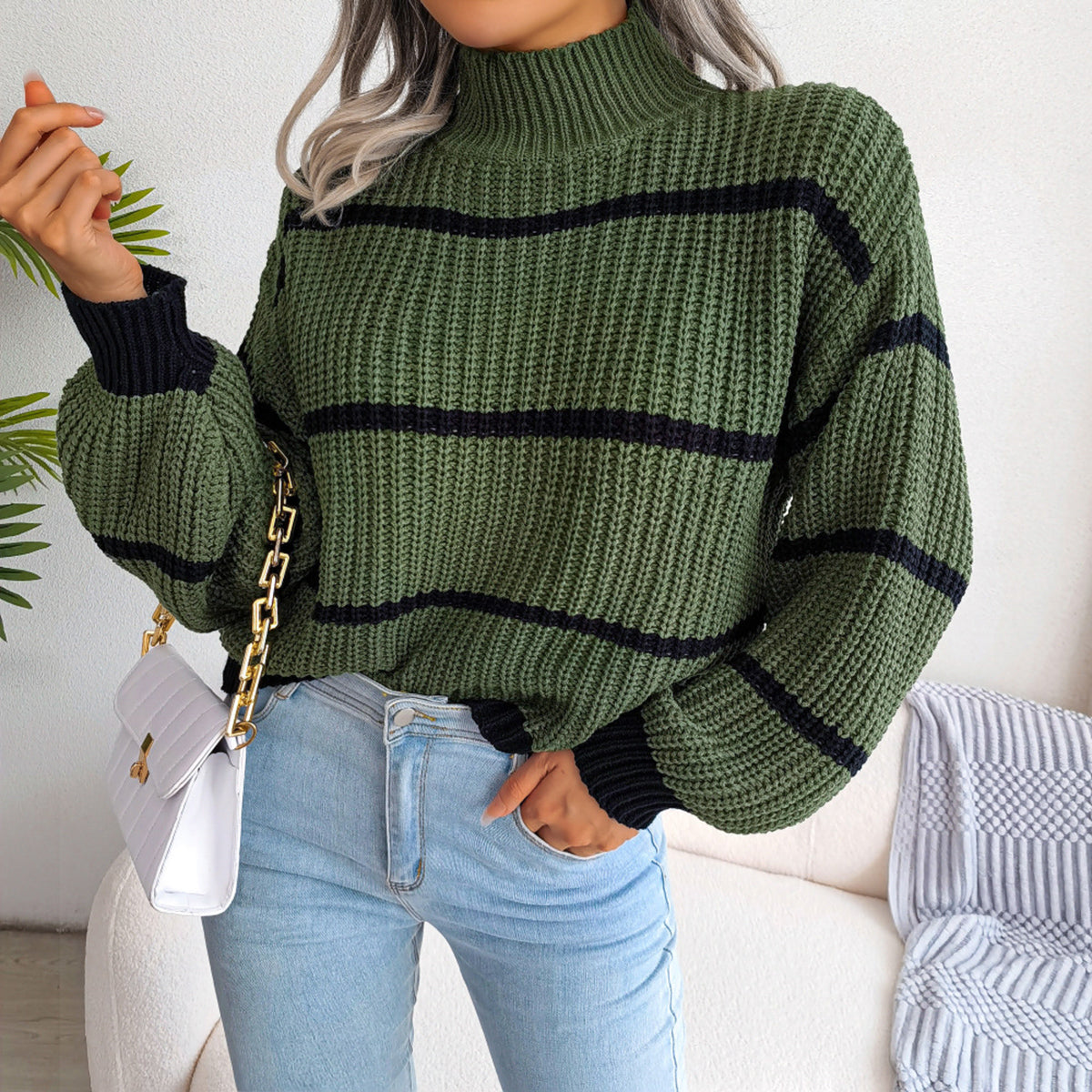 Mock neck striped knit sweater in green with black bands, dropped shoulders