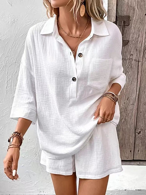 White button-front top and shorts set with collar, chest pocket, drawstring waist.