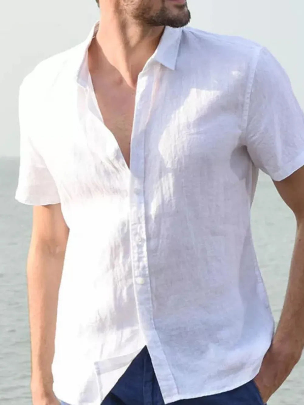 Men's short-sleeve button-down shirt, light blue, open collar with front buttons