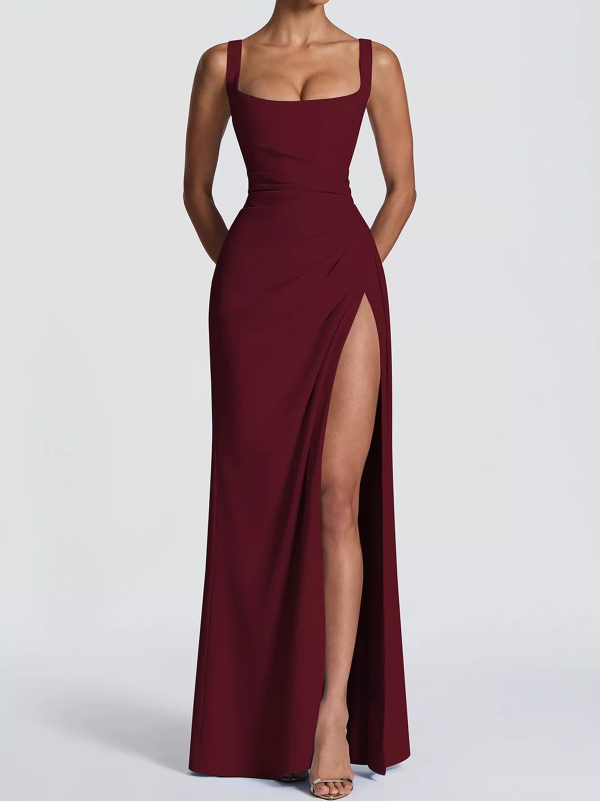 Burgundy backless ruched maxi dress with square neckline, spaghetti straps, and leg slit