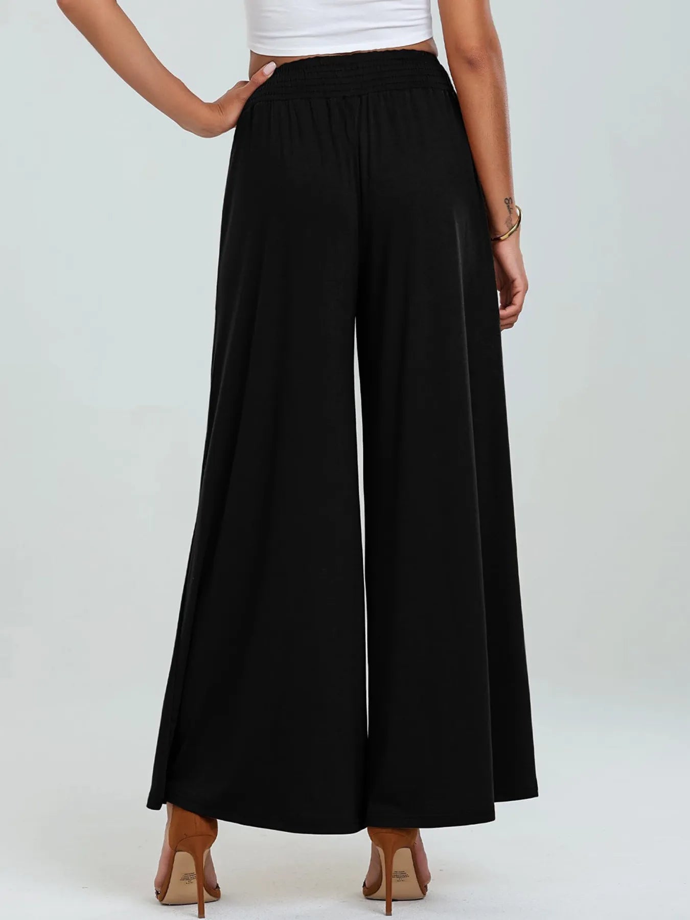 High-waisted wide-leg pants, black, elastic waistband, wide flared legs