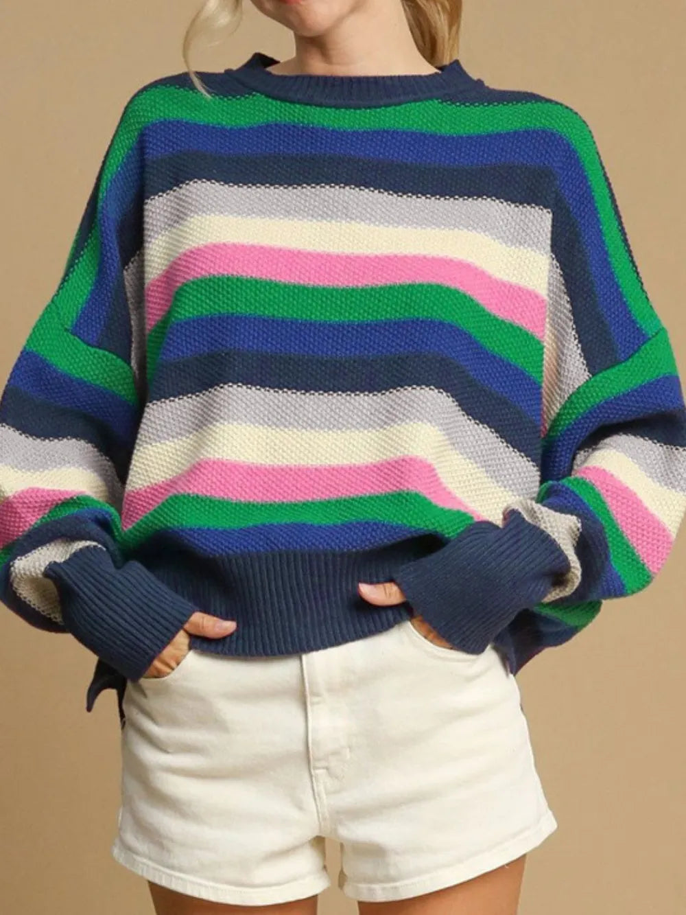 Round-neck long-sleeve sweater in navy, green, blue, white, and pink horizontal stripes