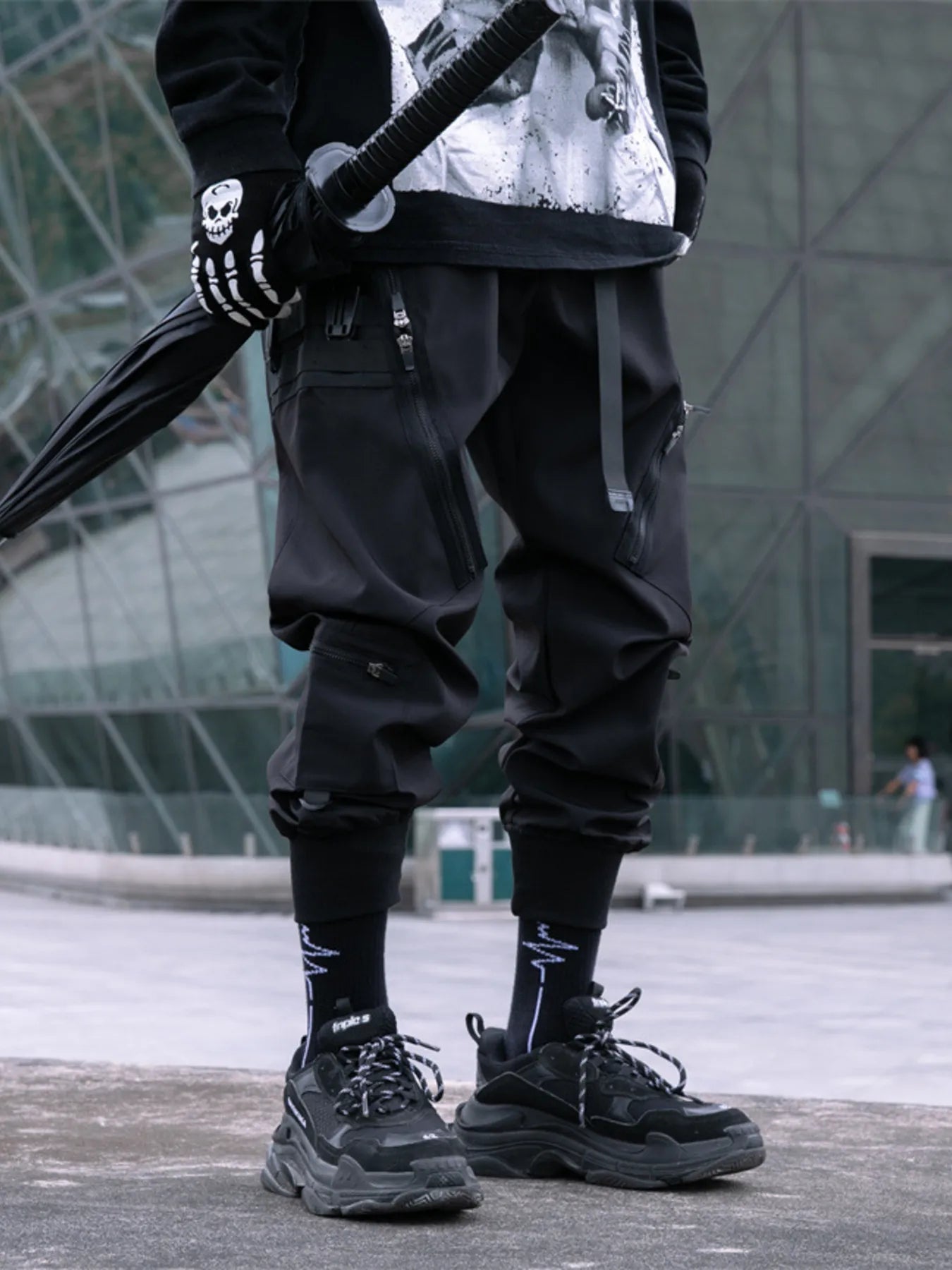 Black cargo joggers with multiple cargo pockets and elastic ankle cuffs