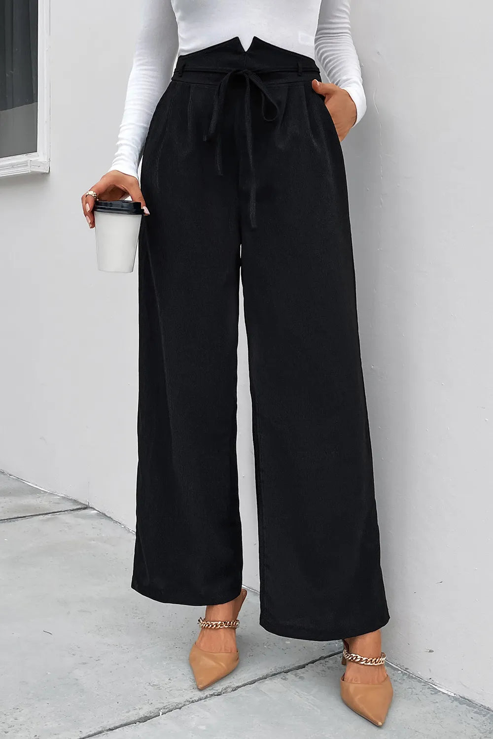 Black high-waist ruched tie-front wide-leg pants with bow detail