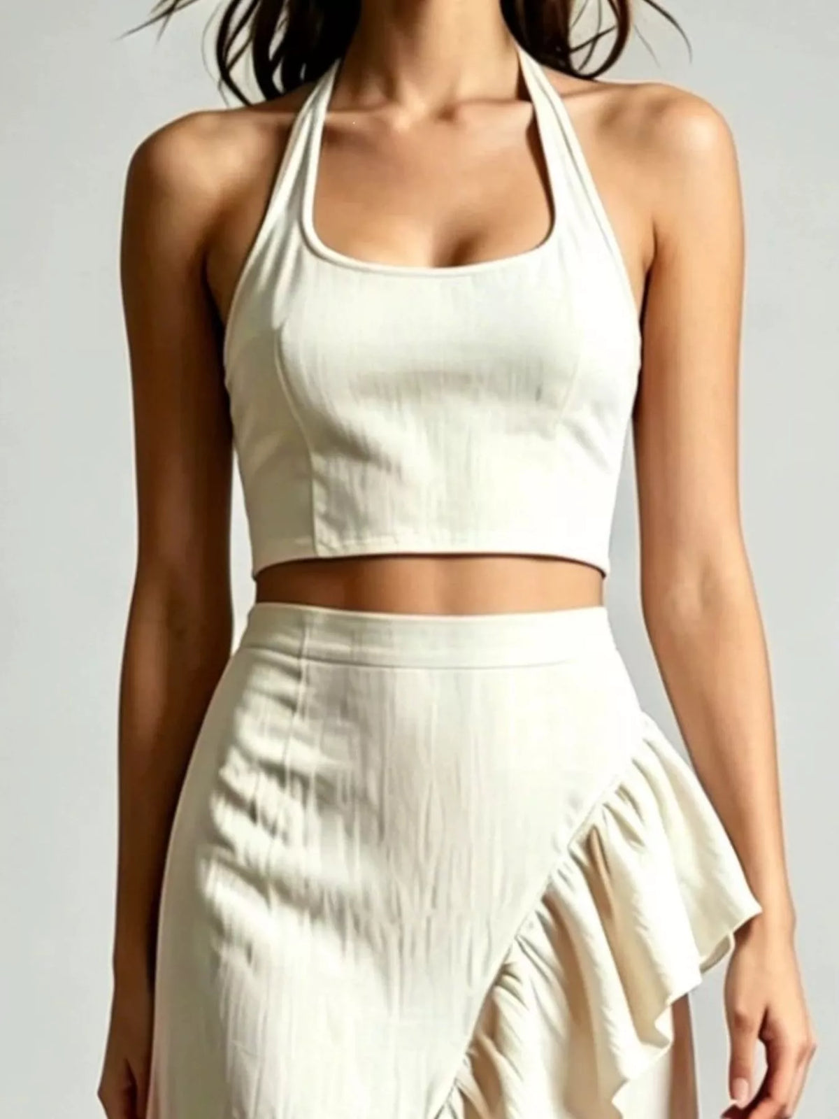 Beige halter crop top with ruffled high-low maxi skirt