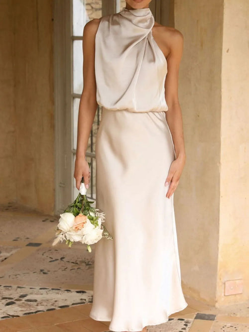 Sleeveless midi satin dress with draped cowl neckline and straight skirt silhouette.