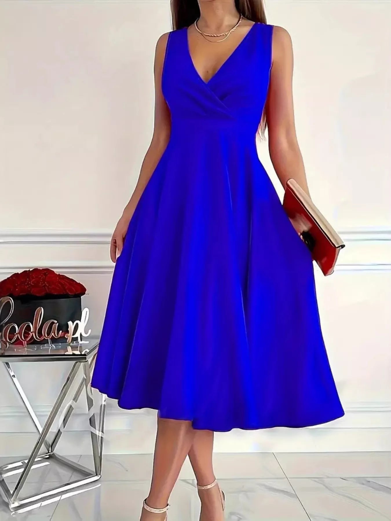 Blue sleeveless V-neck A-line midi dress with full flared skirt