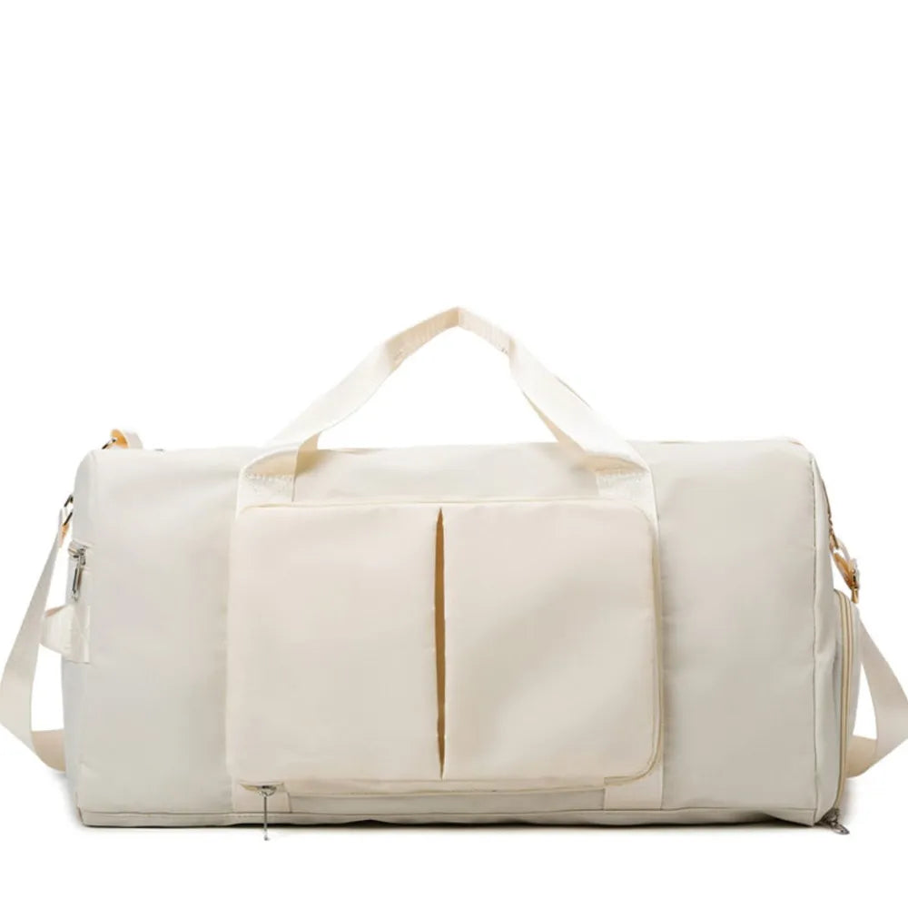 Large travel duffel bag with front zip pocket, light beige body and cream carry handles