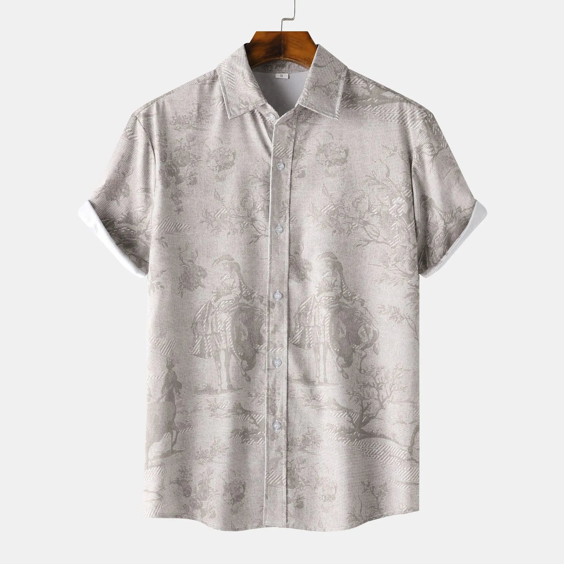 Silver-gray printed short-sleeve button-up shirt with spread collar, front view