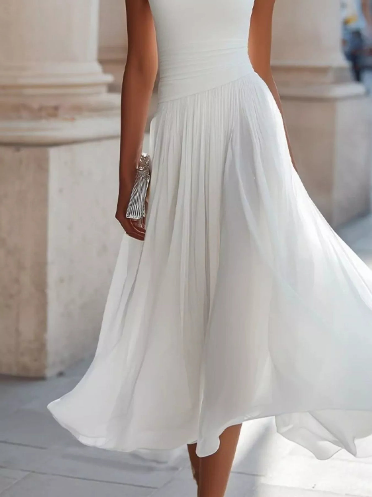 White sleeveless cowl neck midi dress with soft pleated skirt and flared hem