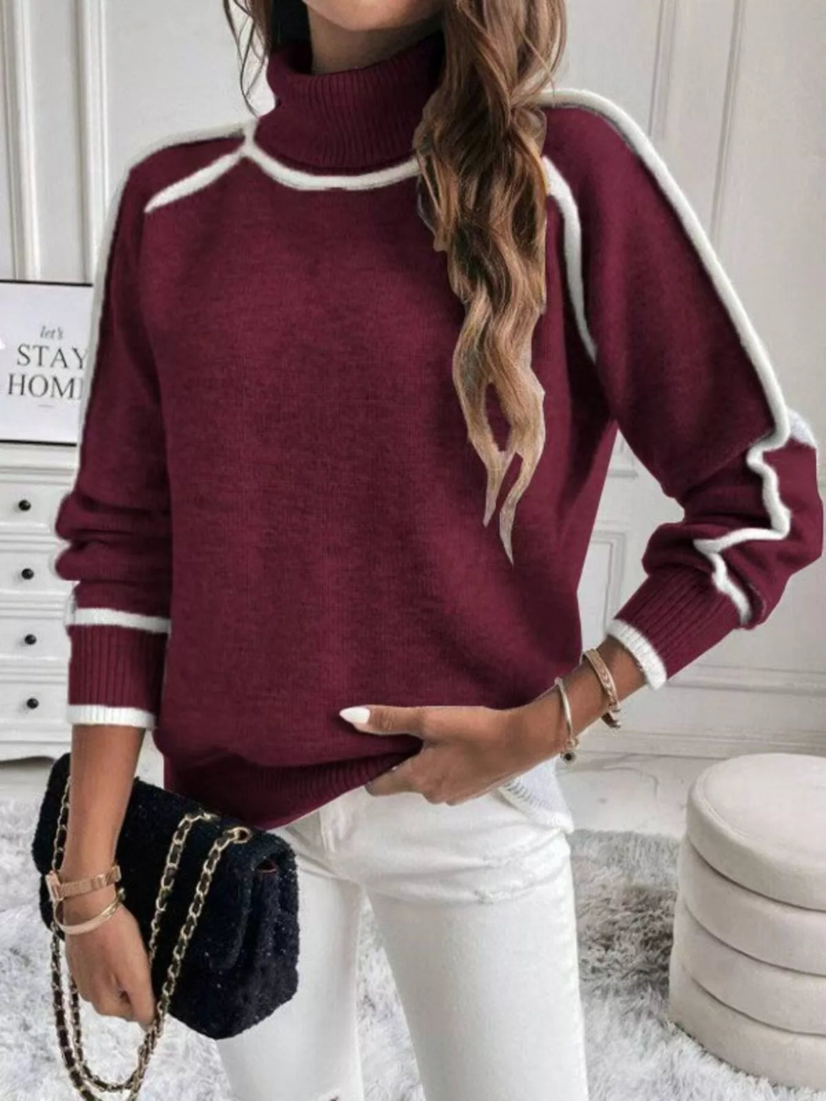 Burgundy ribbed turtleneck sweater with white contrast stripe trim and knit cuffs
