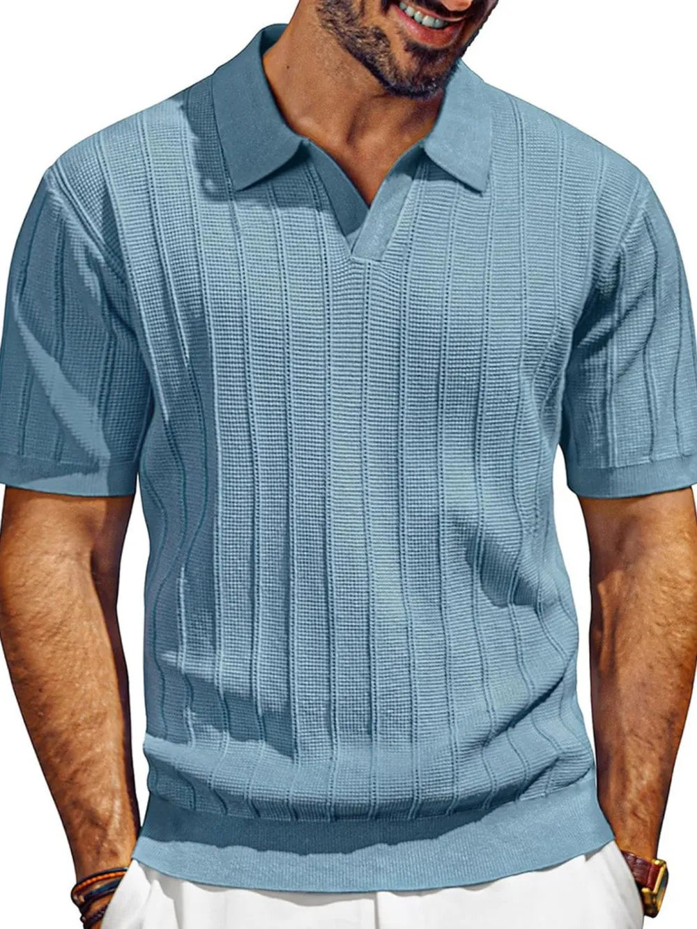 Men's textured polo shirt with collared neck, short sleeves, light blue