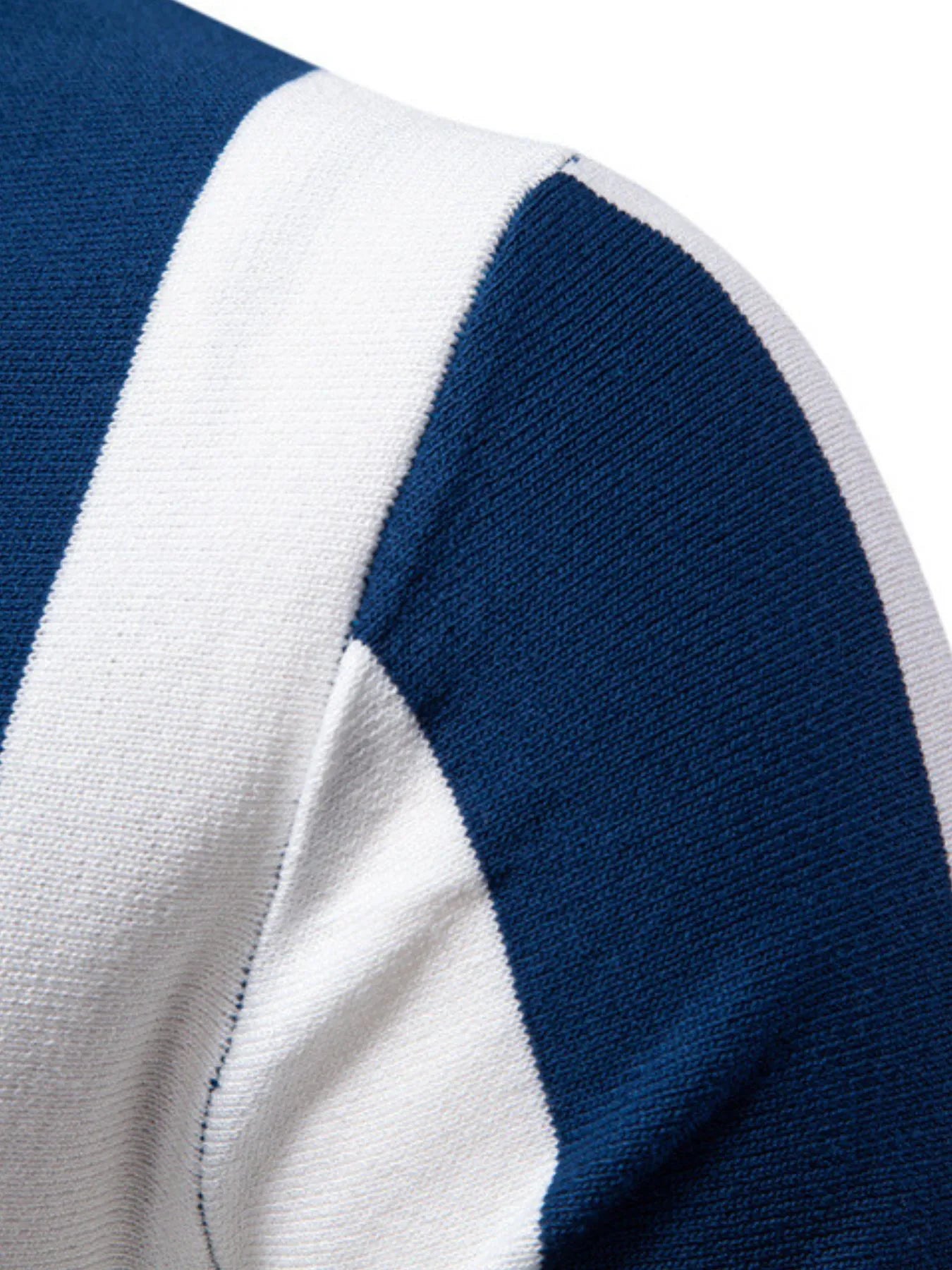 Blue and white vertical striped polo fabric with ribbed knit collar edge